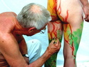Nude body painters in action 35