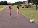 2 nude girls on bicycle and with dog 49