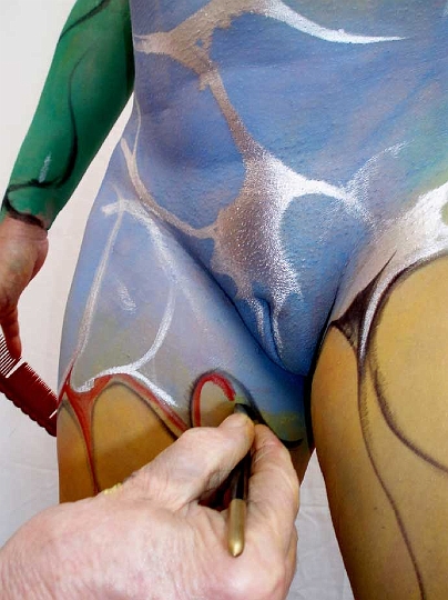 Nude body painters in action 25