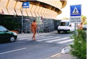 nude crossing road