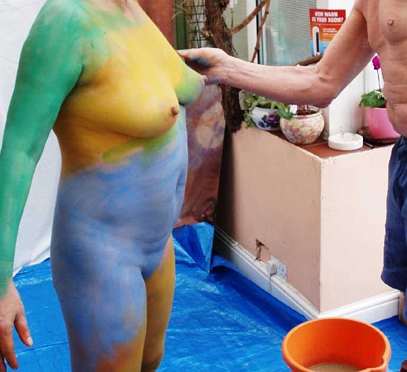 Nude body painters in action 21