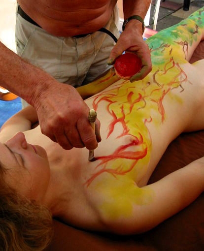 Nude body painters in action 32