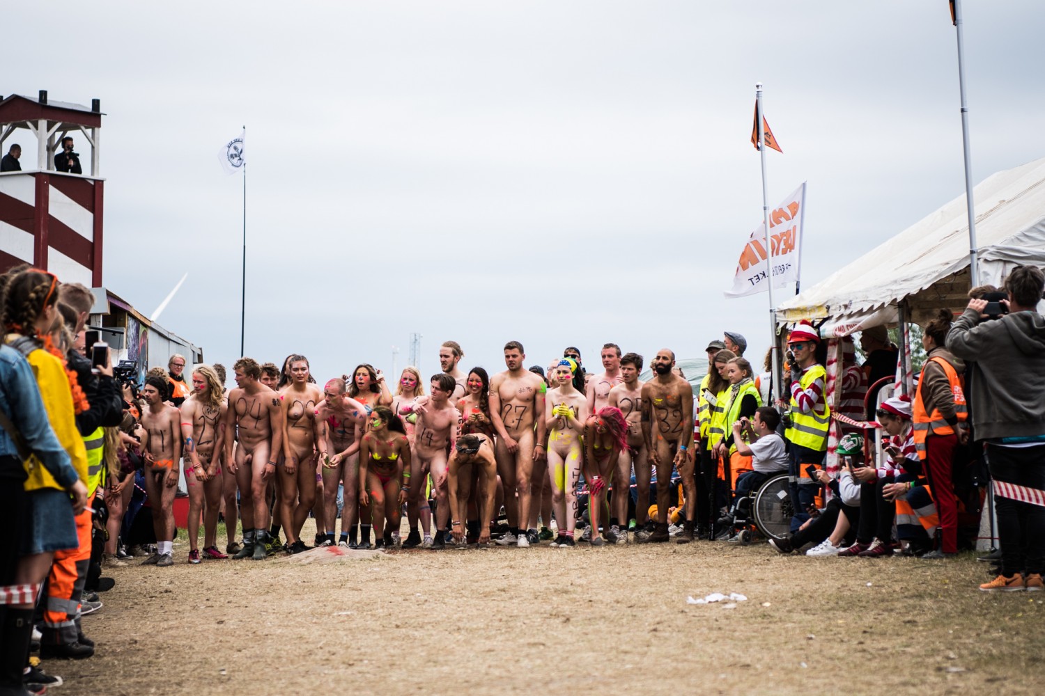 https://www.nudismlife.com/galleries/public_nudity/roskilde_naked_race/2017_roskilde_naked_run/201706_Roskilde_076.jpg